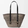 Borsa a cesto intrecciata media in palma iraca e pelle di vitello