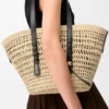 Borsa a cesto intrecciata media in palma iraca e pelle di vitello
