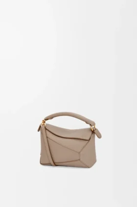 Borsa Mini Puzzle Edge in morbida pelle di vitello martellata