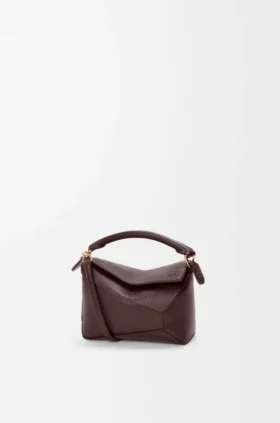Borsa Mini Puzzle Edge in morbida pelle di vitello martellata