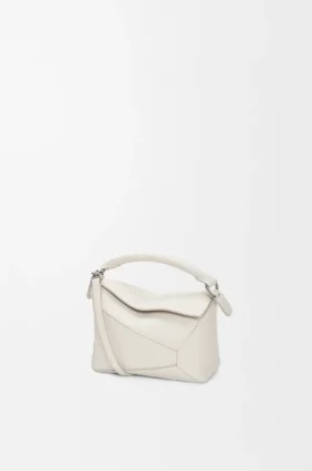 Borsa Mini Puzzle Edge in morbida pelle di vitello martellata