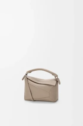 Borsa Mini Puzzle Edge in morbida pelle di vitello martellata