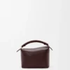 Borsa Mini Puzzle Edge in morbida pelle di vitello martellata