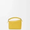 Borsa Mini Puzzle Edge in morbida pelle di vitello martellata