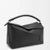 Borsa Puzzle Edge grande in pelle di vitello martellata