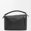 Borsa Puzzle Edge grande in pelle di vitello martellata