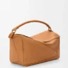 Borsa Puzzle grande in morbida pelle di vitello martellata