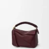 Borsa Puzzle piccola in pelle di vitello liscia e pelle di agnello nappa