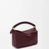 Borsa Puzzle piccola in pelle di vitello liscia e pelle di agnello nappa