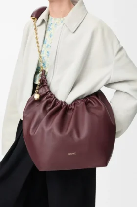 Borsa Squeeze media in morbida pelle di agnello nappa