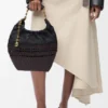 Borsa Squeeze piccola in pelle di vitello nappa intrecciata
