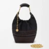 Borsa Squeeze piccola in pelle di vitello nappa intrecciata