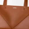 Borsa tote Puzzle Fold media in pelle di vitello lucida