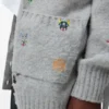 Cardigan in lana con cintura