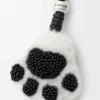 Ciondolo a forma di zampa in shearling e pelle di vitello