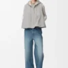 Gilet con cappuccio in shearling