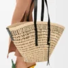 Grande cesta intrecciata in palma Iraca e pelle di vitello