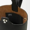 Mini borsa a secchiello Pebble in morbida pelle di vitello martellata