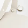 Mini borsa a secchiello Pebble in morbida pelle di vitello martellata