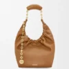 Piccola borsa “Squeeze” in morbida pelle di agnello nappa