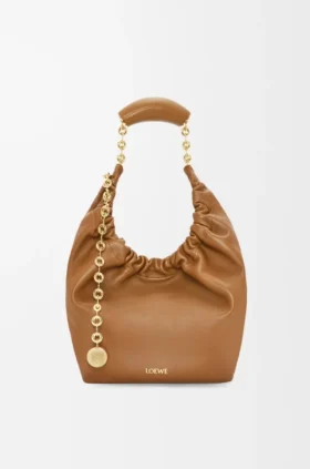 Piccola borsa “Squeeze” in morbida pelle di agnello nappa