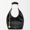 Piccola borsa “Squeeze” in morbida pelle di agnello nappa