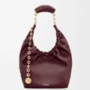 Piccola borsa “Squeeze” in morbida pelle di agnello nappa