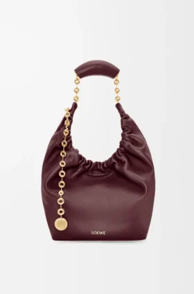 Piccola borsa “Squeeze” in morbida pelle di agnello nappa