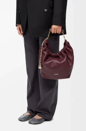 Piccola borsa “Squeeze” in morbida pelle di agnello nappa