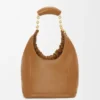 Piccola borsa “Squeeze” in morbida pelle di agnello nappa