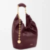 Piccola borsa “Squeeze” in morbida pelle di agnello nappa
