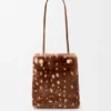 Pochette con logo “Pebble” in shearling stampato