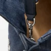 Pochette Flamenco media con gatti in denim ricamato