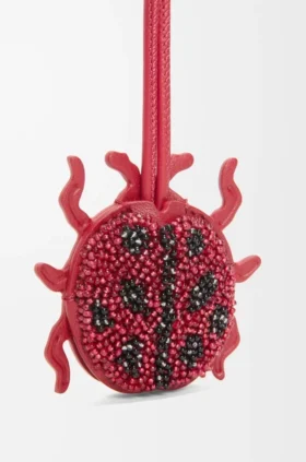 Portachiavi a forma di coccinella in pelle con perline